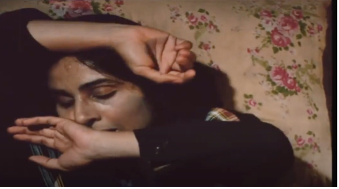 Figure 13: Nā’ī struggling with illness and fever. Frame enlargement of a screenshot from the film Bashu, The Little Stranger (Bāshū, Gharībah-yi Kūchak), directed by Bahrām Bayzā’ī, 1986 (01:38:02).
