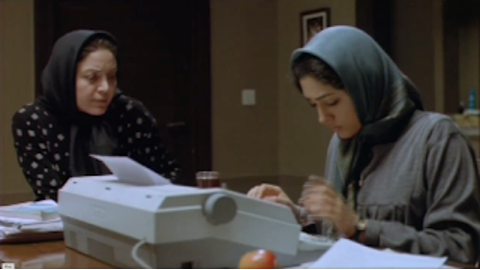 Figure 3: Sipīdah typing, accompanied by her mother. Still from M for Mother (Mīm misl-i mādar), directed by Rasūl Mullāqulīpūr, 2006.