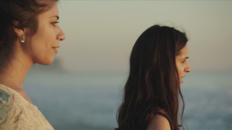 Figure 6: Zaree and Dilījānī by the sea following their conversation. Still from Born in Evin, directed by Maryam Zaree, 2019.