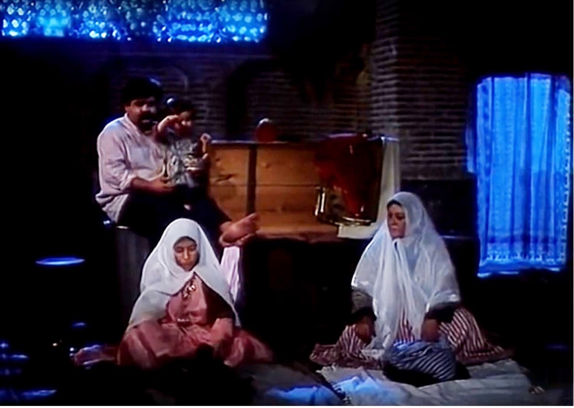 Figure 7: The drummer talking with his wife and mother about traveling to Farang (Europe), still from the film Love Stricken(Dilshudigān), directed by ‘Alī Hātamī, 1992.